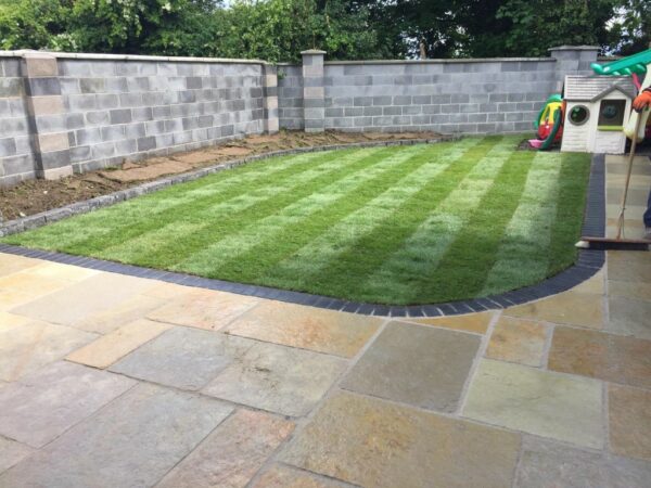 New Limestone Patio with Roll-Out Turf in Dublin